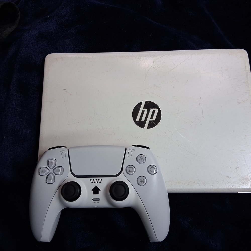 HP Laptop, Nitendo, Sony, Playstation, with White Controller